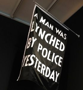 Dread Scott - "A Man Was Lynched" flag